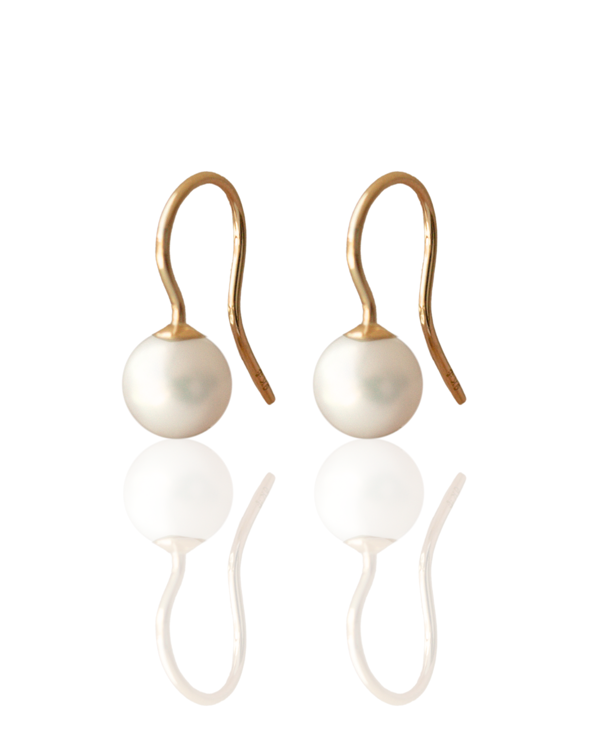 These Simple Pearl Hook Earrings feature a pair of Broken Bay (NSW) grown 7mm AA grade (moderately blemished) Australian Akoya pearls set in 9ct yellow gold.