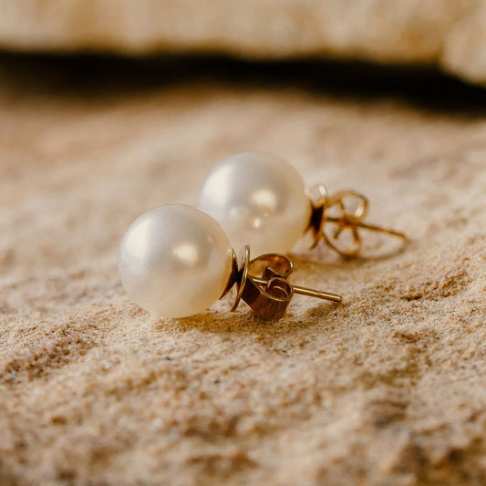 An incredible pair of Cygnet Bay grown South Sea round pearl studs shining with their natural colour and lustre.