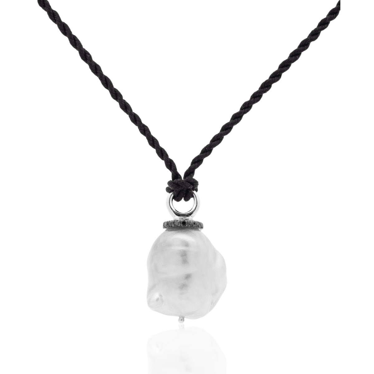 A stunning Stella Pearl Pendant featuring a Cygnet Bay (WA) grown Australian South Sea pearl complemented by 17 Black Diamonds set in gold, delicately hung on a 100% black Silk Cord Rope.