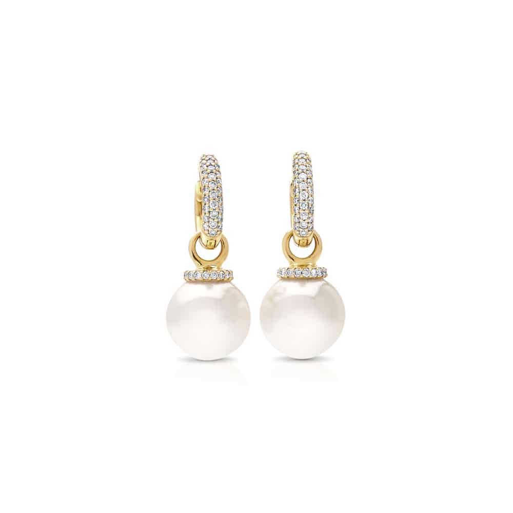 A stunning pair of Stella Pearl Huggie Earrings featuring Cygnet Bay (WA) grown Australian South Sea pearls complemented by 96 White Diamonds set in yellow gold.