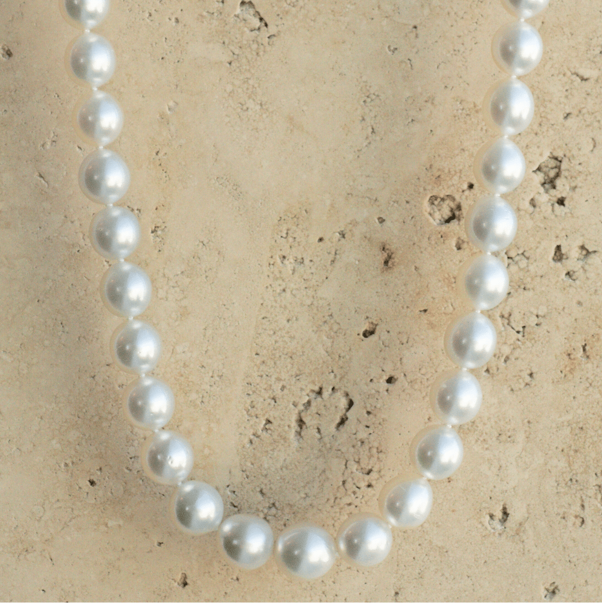 This striking Pearl Strand Necklace features thirty-nine (39) 10 to 12.5mm Drop A2 to B2 grade Cygnet Bay (WA) grown Australian South Sea pearls. This 45cm pearl strand is set with a 18ct White Gold clasp.