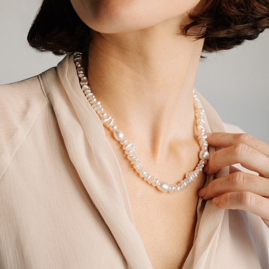 This striking Keshi Pearl Strand Necklace features ninety-five (95) 5 to 10mm A grade Cygnet Bay (WA) grown Australian South Sea Keshi pearls. This 46cm pearl strand is carefully hand strung with silk and set with an 18ct White Gold Ball Clasp.