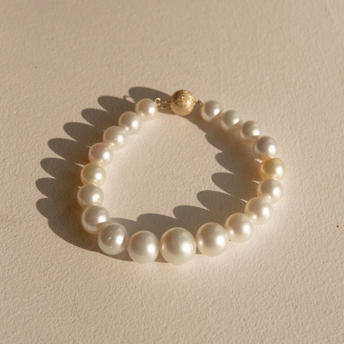 Strand Bracelet Australian South Sea Cygnet Bay Round/Near Round 8.5-13mm A3/B2 White Cream 19pc 21.5cm 9ct Yellow Gold Ball Clasp