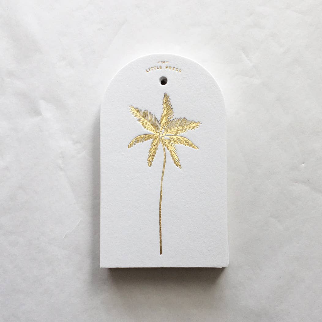 Luxury tags for gifting and decorating, in a die-cut arch shape with hole punch.

