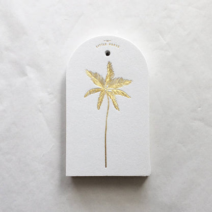 Luxury tags for gifting and decorating, in a die-cut arch shape with hole punch.

