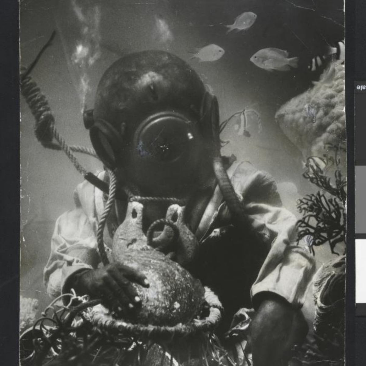 Diver wearing a vintage diving helmet when diving for Mother of pearl shell in Broome.
