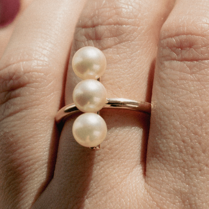 A person wears their unique Akoya Pearl Ring featured Broken Bay (NSW) grown Australian Akoya pearls set in gold.