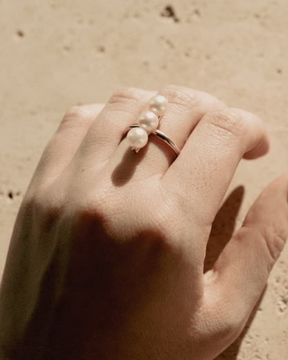 A person wears their unique Akoya Pearl Ring featured Broken Bay (NSW) grown Australian Akoya pearls set in gold.