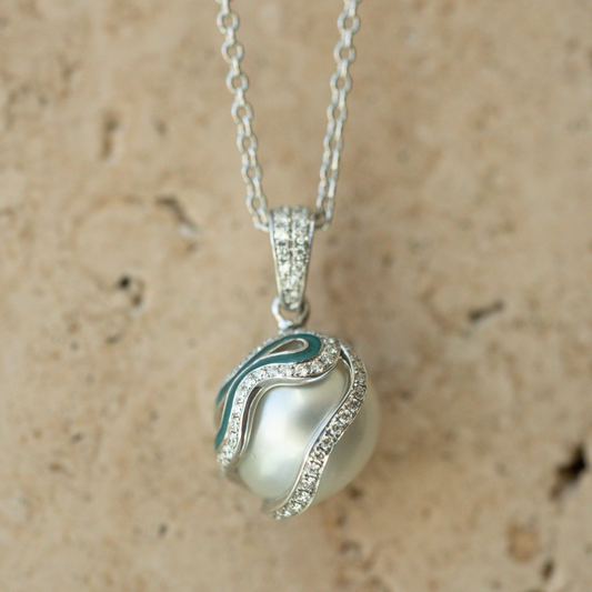 Pearl pendant necklace with a textured beige background