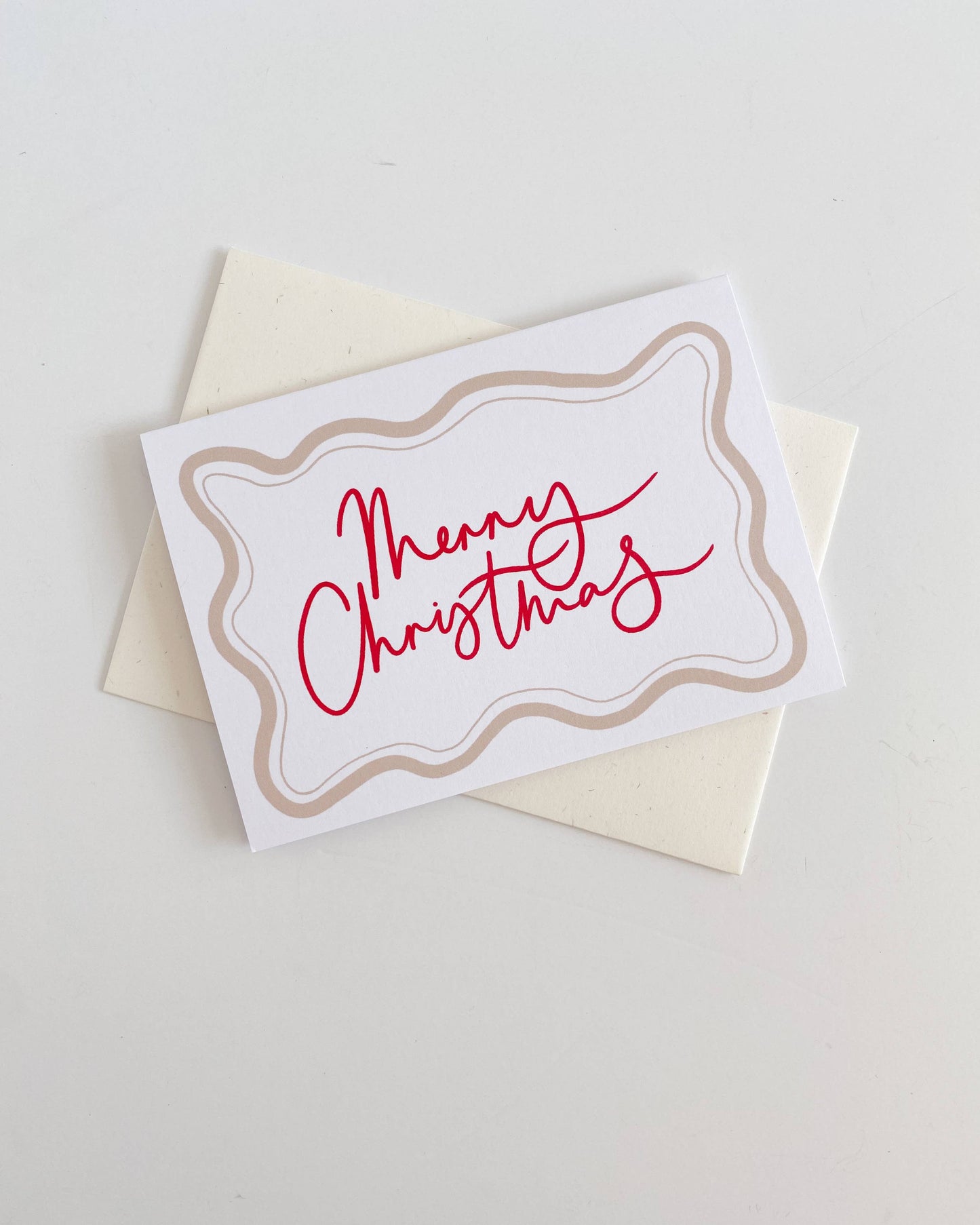 Christmas card with 'Merry Christmas' text on a white background