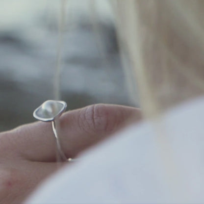 A woman wears her stunning Kimberely Lily Keshi Pearl Ring that features an organic shaped Keshi pearl grown at our Cygnet Bay Pearl Farm.