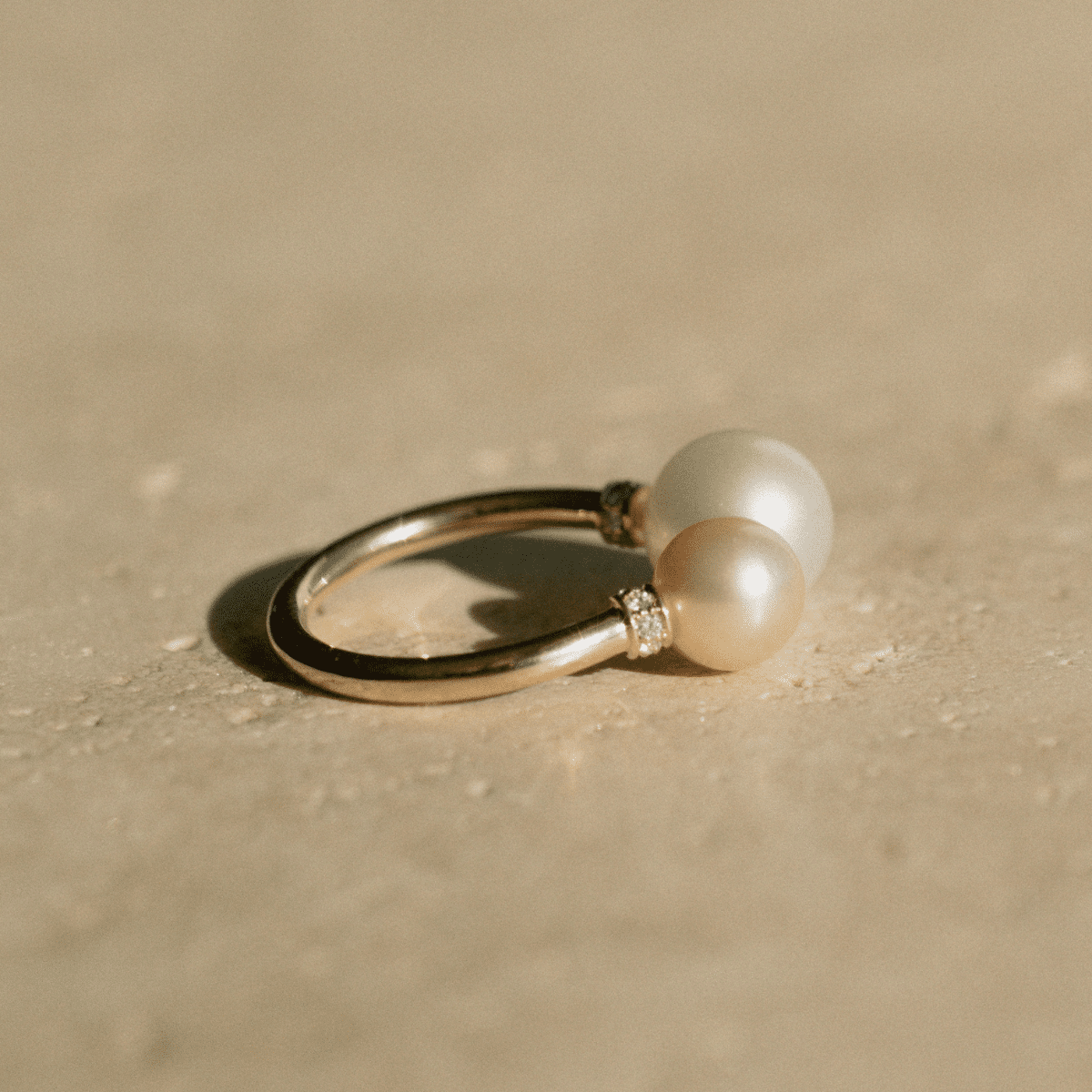 This incredible Provenance Open Diamond Rondel Pearl Ring features a Cygnet Bay (WA) grown Australian South Sea pearl and two Broken Bay (NSW) grown Australian Akoya pearls set on a gold band, with two sparkling diamond rondels.