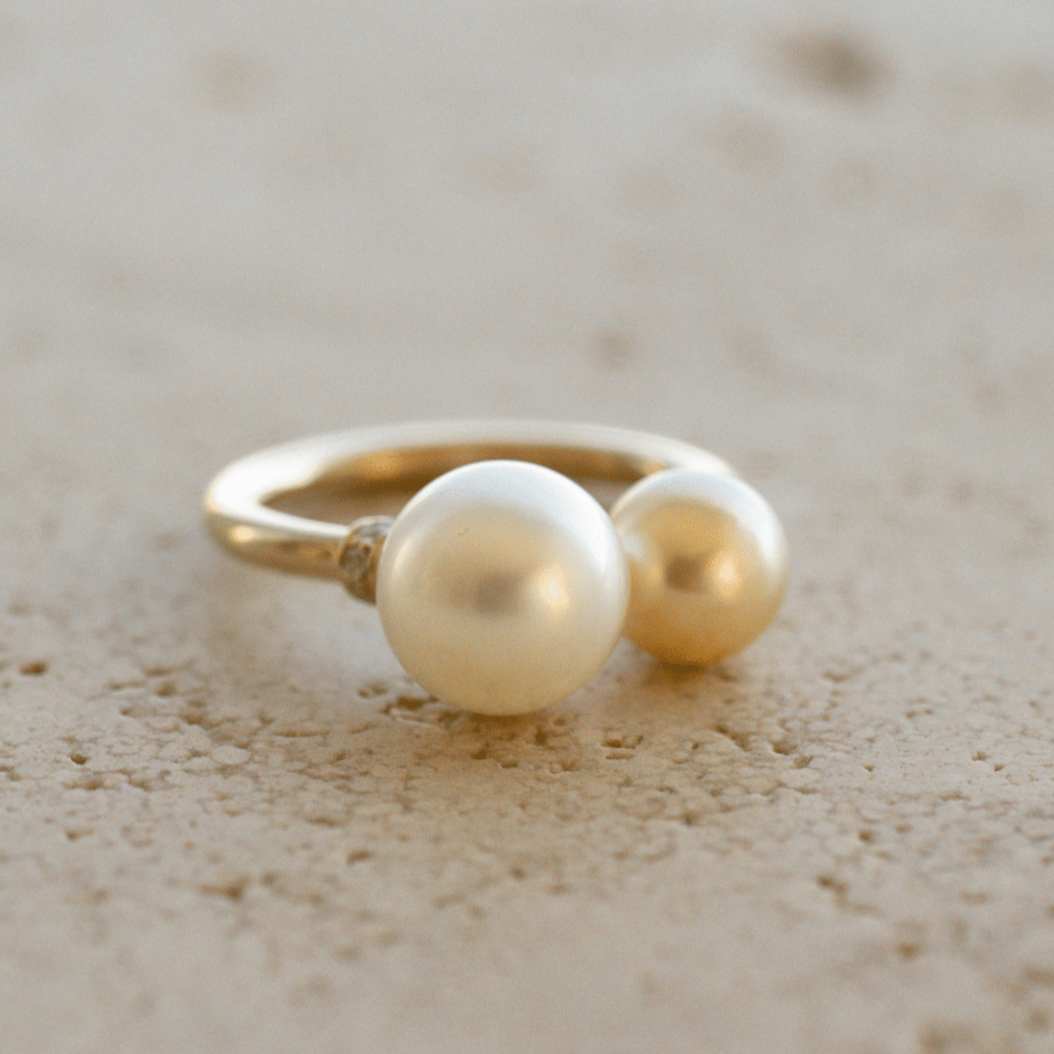 This incredible Provenance Open Diamond Rondel Pearl Ring features a Cygnet Bay (WA) grown Australian South Sea pearl and two Broken Bay (NSW) grown Australian Akoya pearls set on a gold band, with two sparkling diamond rondels.