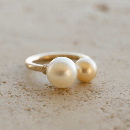 This incredible Provenance Open Diamond Rondel Pearl Ring features a Cygnet Bay (WA) grown Australian South Sea pearl and two Broken Bay (NSW) grown Australian Akoya pearls set on a gold band, with two sparkling diamond rondels.