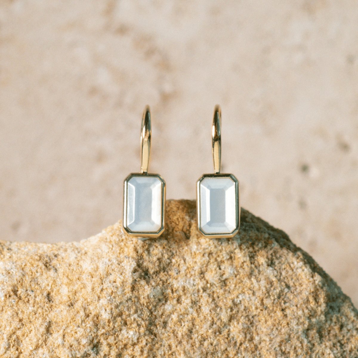 These stunning Radiance Emerald Cut Hook Earrings features faceted Mother of Pearl grown at our Cygnet Bay Pearl Farm set in gold.