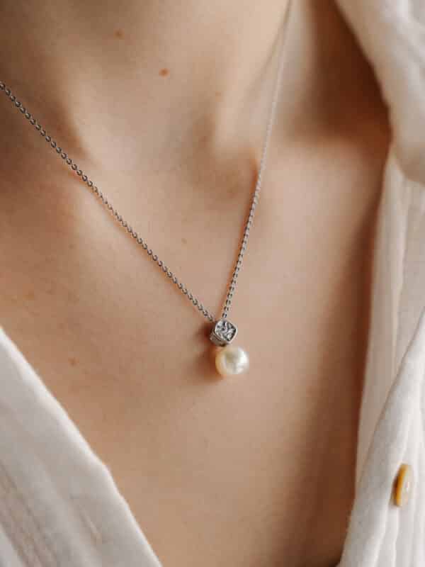 Seagrass Pendant worn by Model